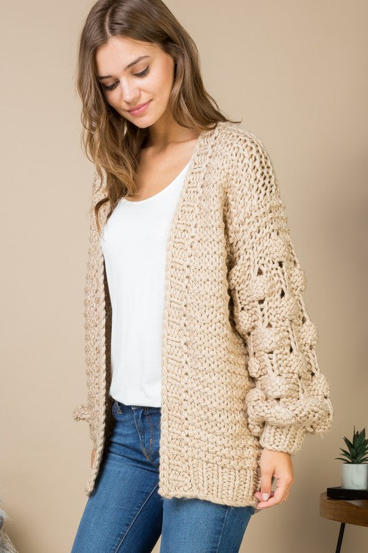 Cardigan with store pom pom sleeves